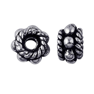 Silver Overlay Over Copper antique floral rope style spacer jewelry component, handcrafted in India, shown in front and side view.
