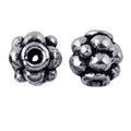 Silver Overlay Over Copper antique rounded floral bead spacer jewelry component, handcrafted in India, shown in front and side view.