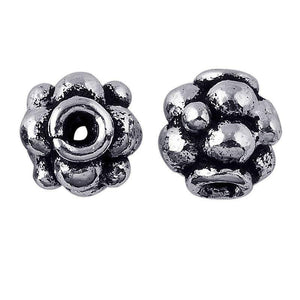 Silver Overlay Over Copper antique rounded floral bead spacer jewelry component, handcrafted in India, shown in front and side view.