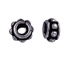 Silver Overlay Over Copper antique scalloped floral spacer jewelry component, handcrafted in India, shown in front and side view.