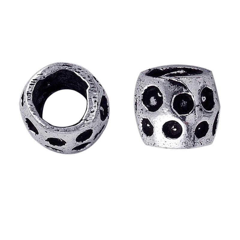 Silver overlay dotted barrel spacer bead with oxidized carved detailing.