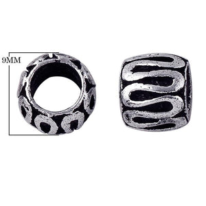 Silver Overlay Over Copper antique wave pattern barrel spacer jewelry component, handcrafted in India, shown in front and side view.