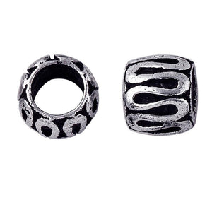 Silver Overlay Over Copper antique wave pattern barrel spacer jewelry component, handcrafted in India, shown in front and side view.