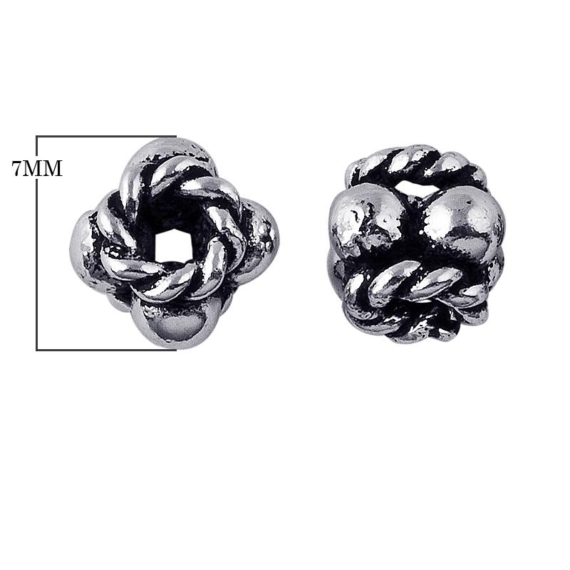 Silver Overlay Over Copper antique interwoven rope knot floral spacer jewelry component, handcrafted in India, shown in front and side view.