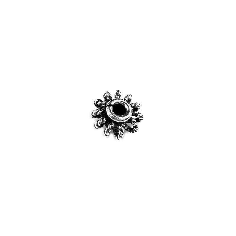 Handcrafted twisted floral ring spacer bead made with Silver Overlay Over Copper, rope-style petal detailing, artisan jewelry component from India.