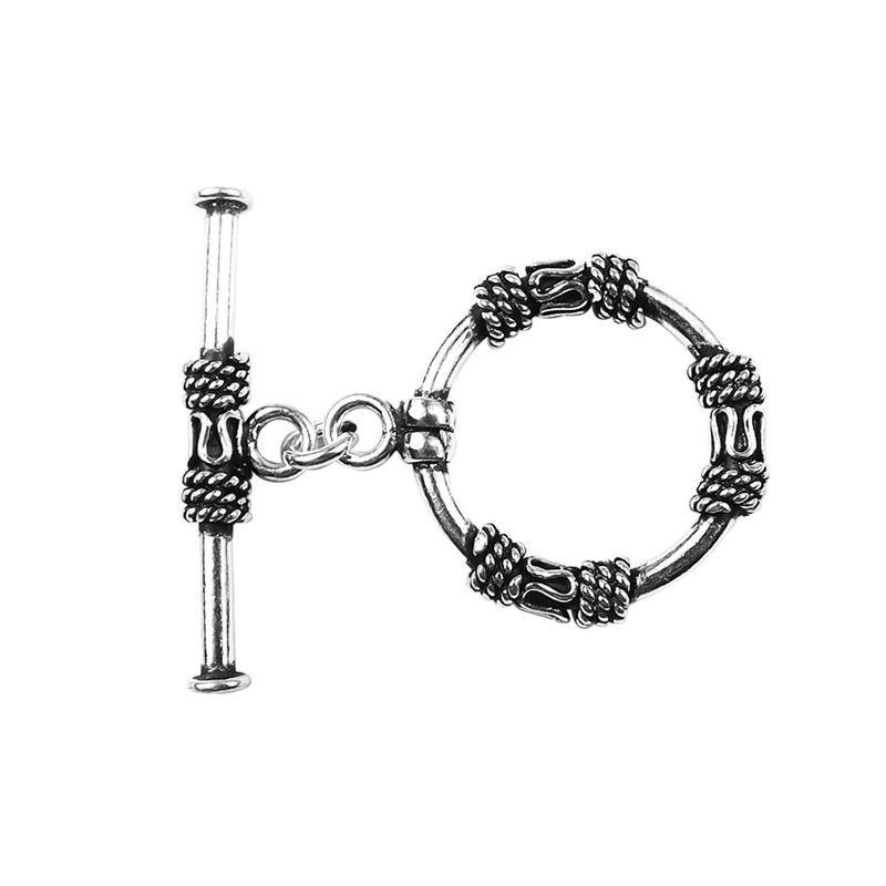 Silver Overlay ornate circular toggle clasp with rope-wrapped detailing and bar closure, handcrafted jewelry finding for wholesale buyers, handcrafted in India.