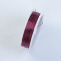 Handcrafted purple silver overlay over copper wire spool for jewelry making from India